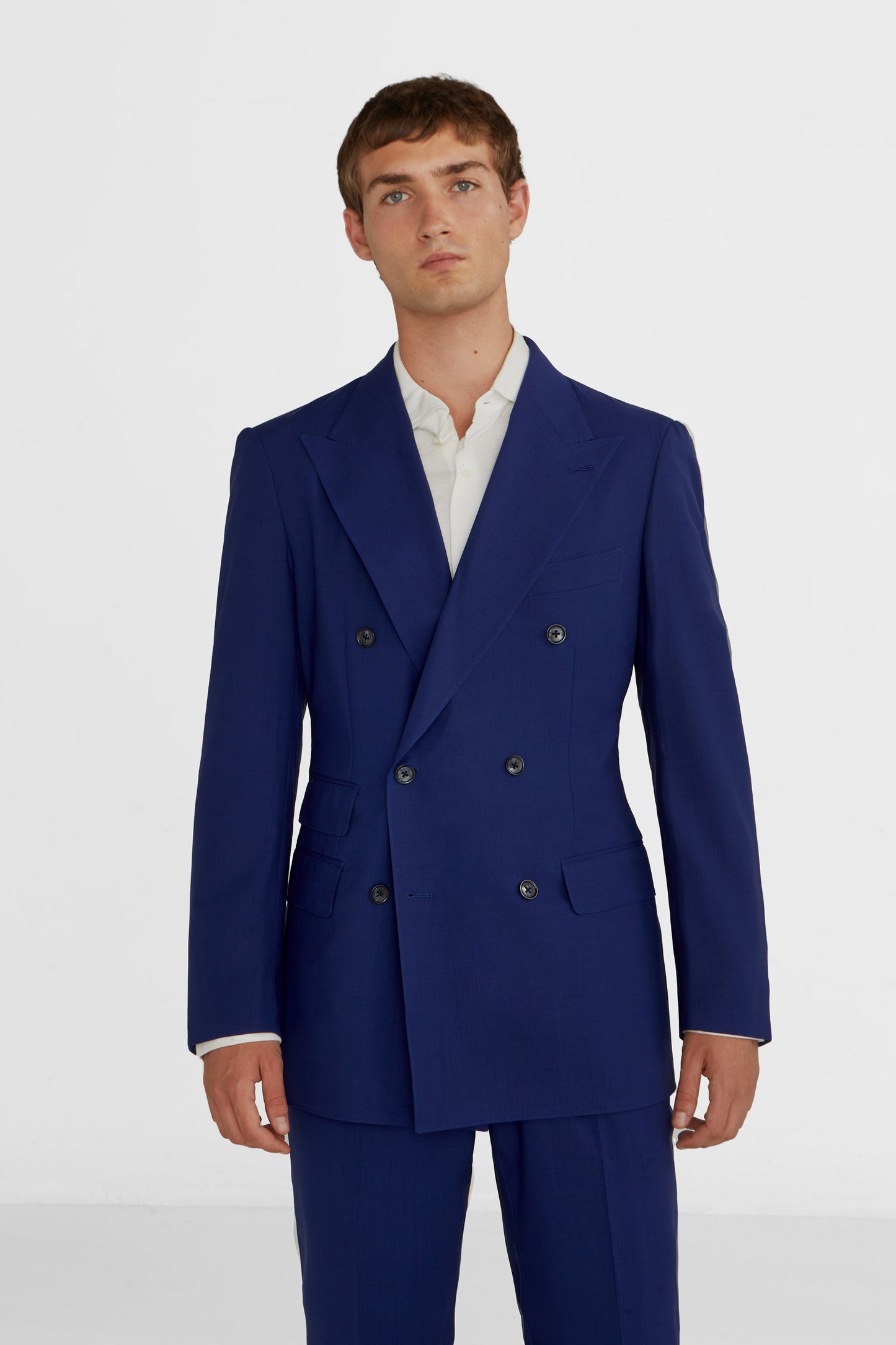 Decontructured light double - breasted suit super 120 wool